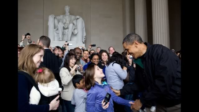 President Barack Obama greets surprised tourists at the Lincoln Memorial in Washington, D.C., Saturday, April 9, 2011. The President made an unannounced stop to thank people for visiting the memorial a day after he and Congressional leaders agreed on a bill to keep the government open. (Official White House Photo by Pete Souza)