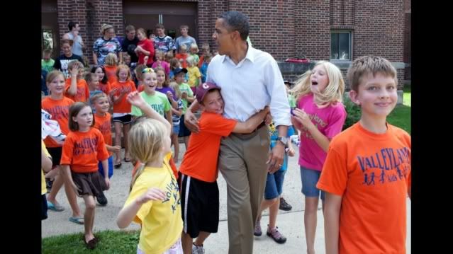 President Barack Obama greets children from the Valleyland Kids summer program outside a school in Chatfield, Minn., during a stop on his three-day bus tour in the Midwest, Aug. 15, 2011. (Official White House Photo by Pete Souza)