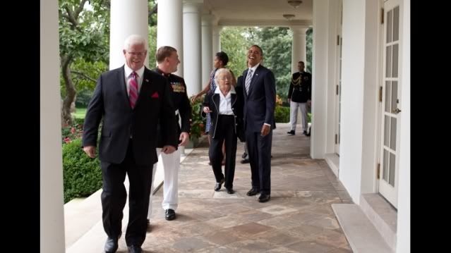 President Barack Obama shares a laugh with Jean Meyer, the grandmother of Medal of Honor recipient Dakota Meyer, second from left, as they and members of the Meyer family walk along the Colonnade of the White House, Sept. 15, 2011. (Official White House Photo by Pete Souza)