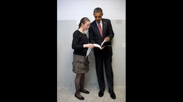 President Barack Obama talks with student Rebecca Hyndman before visiting classrooms at Thomas Jefferson High School for Science and Technology in Alexandria, Va., Sept. 16, 2011. Hyndman, a Senior at Thomas Jefferson, showed the President the patent she received in 2010 for her invention, Under-Floor Storage. (Official White House Photo by Pete Souza)